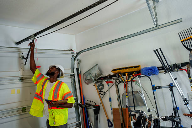 Professional Garage Door Panel Replacement technician working in Lakefield, MN